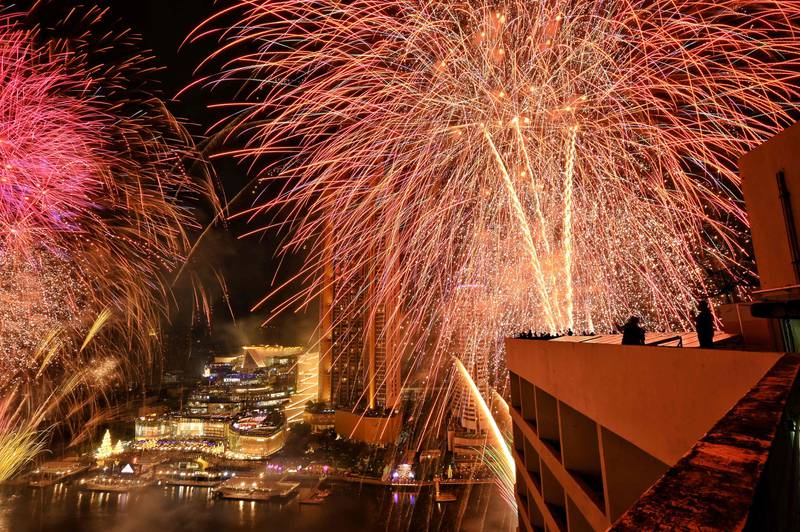New Year’s Eve fireworks erupt over the Chao Praya River in Bangkok. AFP