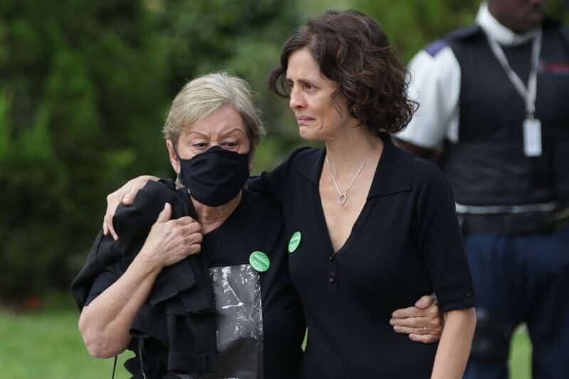 Alessandra Sampaio, wife of British journalist Dom Phillips, at his funeral with her mother Maria Lucia Farias Sampaio. EPA