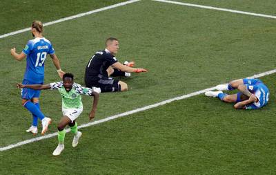 Ahmed Musa celebrates after scoring his side's opening goal. Themba Hadebe / AP Photo