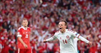 Denmark's Mikkel Damsgaard celebrates scoring their first goal. Reuters