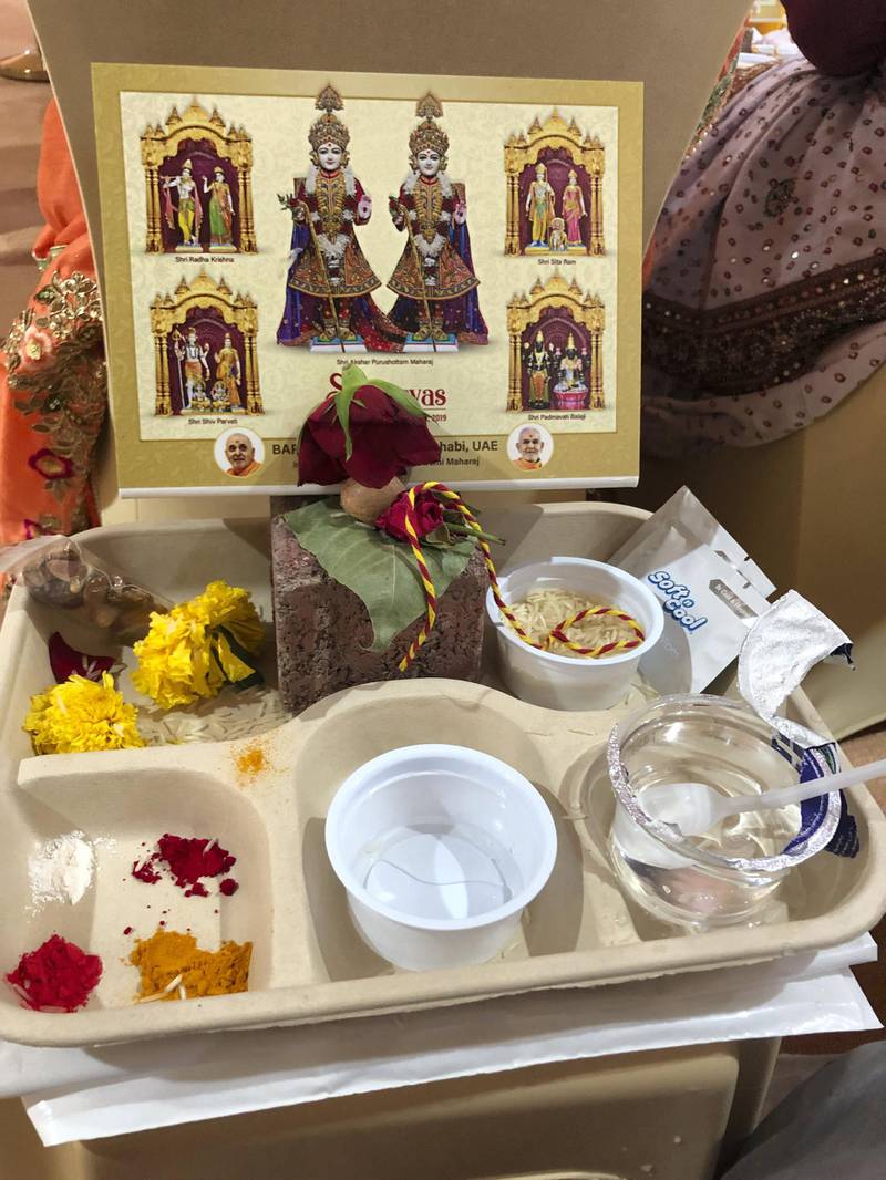Devotees were presented with a prayer tray to mark the occasion.