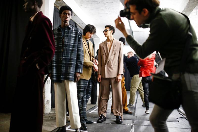 Models prepare backstage ahead of the Qasimi catwalk show at London Fashion Week Mens in London, Britain, January 5, 2020. REUTERS/Henry Nicholls