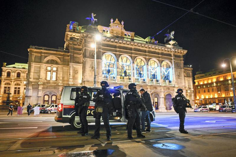 VIENNA, AUSTRIA - NOVEMBER 02: Heavily armed police stand outside the Vienna State Opera following shots fired in the city center on November 02, 2020 in Vienna, Austria. Police blocked off nearby streets around Schwedenplatz square and urged people to stay away in what seems to be an ongoing event possibly involving several attackers. (Photo by Michael Gruber/Getty Images)
