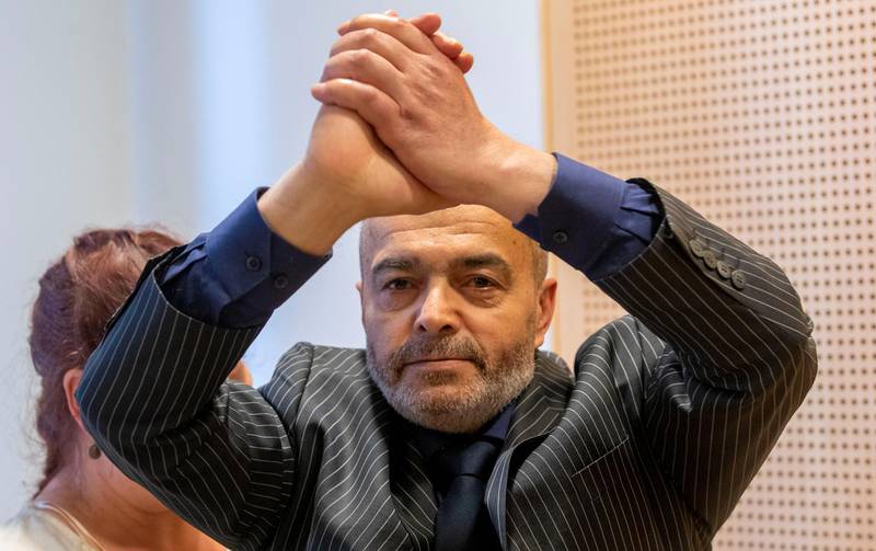 (FILES) In this file photo taken on September 25, 2020 Walid Abdulrahman Abu Zayed gestures during the court hearing in connection with a French extradition request at the Oslo District Court on September 25, 2020. - Walid Abdulrahman arrived in France on December 4, 2020 after Norway agreed on November 27, 2020 to extradite to France this suspect linked to a 1982 attack in Paris that killed six people, bringing hope to families of the victims who have demanded a trial for almost 40 years. (Photo by Terje Bendiksby / NTB / AFP) / Norway OUT
