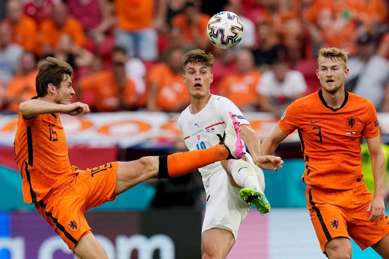 Czech Republic's forward Patrik Schick challenges Netherlands' midfielder Marten de Roon, left, and defender Matthijs de Ligt. AFP
