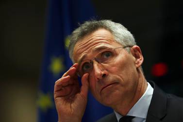 Nato Secretary General Jens Stoltenberg prepares to address European parliament foreign affairs committee members in January on the alliance's need to beef up its military training operation in Iraq once the government in Baghdad requests that it resume work. Francisco Seco / AP Photo