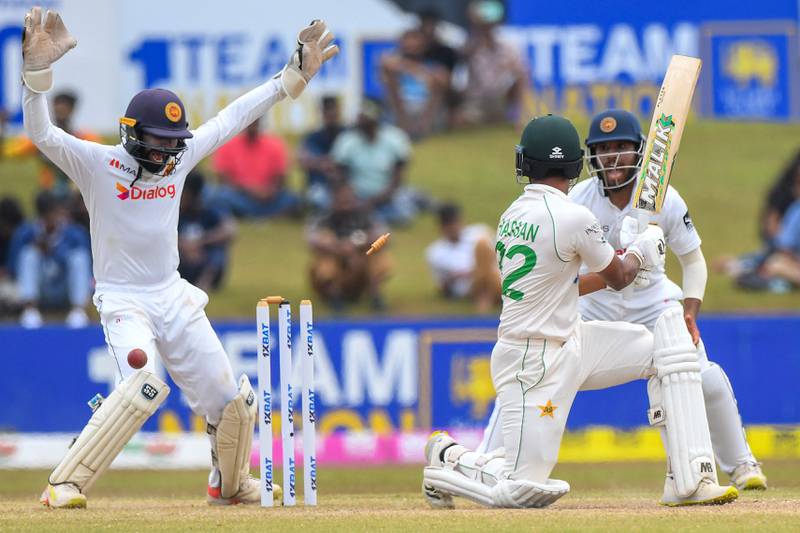 Sri Lanka's wicketkeeper Niroshan Dickwella reacts as Pakistan's Hasan Ali is bowled during the final day of the second Test in Galle on Thursday, July 28, 2022. AFP