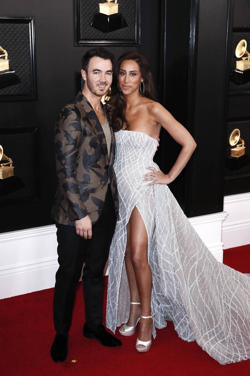 Kevin Jonas and wife Danielle Jonas arrive for the 62nd annual Grammy Awards ceremony. EPA