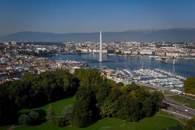 This file photo taken on September 14, 2019 shows an aerial view from the "Parc La Grange" of the Geneva landscape with the Jet d'Eau fountain on Lake Geneva. - Russian leader Vladimir Putin and US President Joe Biden are to meet in Geneva on June 16, 2021 amid the biggest crisis in ties between their two countries in recent history. (Photo by FABRICE COFFRINI / AFP)