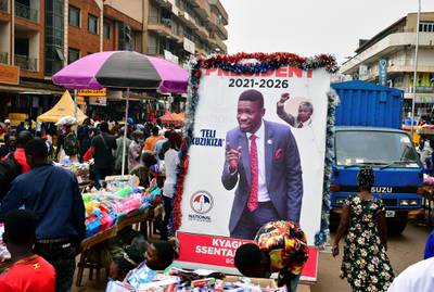 An electoral campaign poster of Bobi Wine is seen on a street ahead of the presidential and parliamentary elections, in Kampala. Reuters