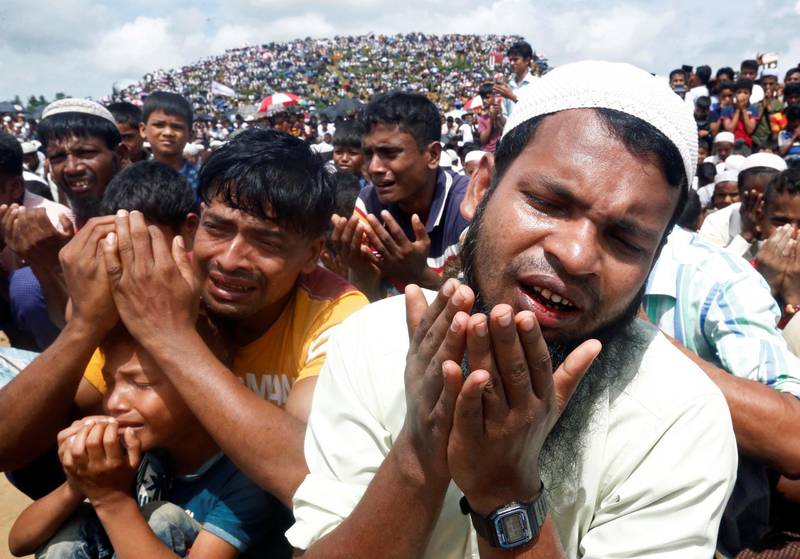 Rohingya refugees take part in a prayer as they gather to mark the second anniversary of the exodus at the Kutupalong camp in Cox’s Bazar, Bangladesh, August 25, 2019. REUTERS/Rafiqur Rahman