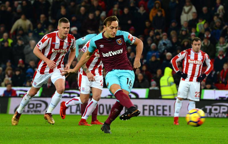STOKE ON TRENT, ENGLAND - DECEMBER 16: Mark Noble of West Ham United scores his sides first goal from the penalty spot during the Premier League match between Stoke City and West Ham United at Bet365 Stadium on December 16, 2017 in Stoke on Trent, England.  (Photo by Tony Marshall/Getty Images)