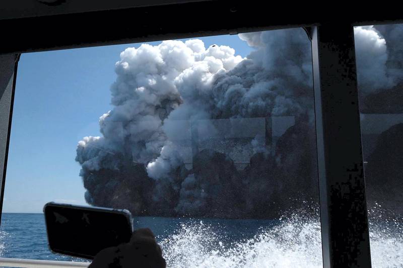 The White Island Volcano eruption is seen from a boat used to rescue tourists. Courtesy of Michael Schade /Twitter