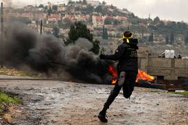 Palestinian youths clash with Israeli troops - in pictures