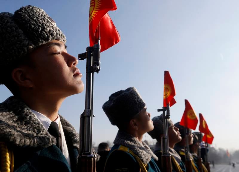 Kyrgyz soldiers during a procession dedicated to the Day of the State Flag on the central Ala-Too Square in the centre of Bishkek. The National Flag Day of Kyrgyzstan, celebrated annually on March 3, was established to educate citizens in the spirit of patriotism and respect for the state symbols of the country. EPA