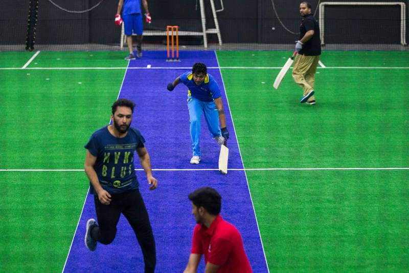 Dubai, United Arab Emirates, July 18, 2017:    A group of men play pick-up indoor cricket at the Insportz Club in the Al Quoz area of Dubai on July 18, 2017. Christopher Pike / The NationalReporter: Paul RadleySection: Sport