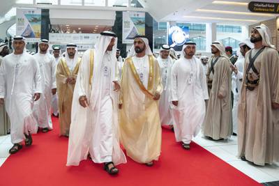 ABU DHABI, UNITED ARAB EMIRATES - February 17, 2019: HH Sheikh Mohamed bin Zayed Al Nahyan, Crown Prince of Abu Dhabi and Deputy Supreme Commander of the UAE Armed Forces (center L) and HH Sheikh Mohamed bin Rashid Al Maktoum, Vice-President, Prime Minister of the UAE, Ruler of Dubai and Minister of Defence (center R), attend the opening ceremony of the 2019 International Defence Exhibition and Conference (IDEX), at Abu Dhabi National Exhibition Centre (ADNEC). Seen with HH Sheikh Hamdan bin Mohamed Al Maktoum, Crown Prince of Dubai (3rd L).

( Mohamed Al Hammadi / Ministry of Presidential Affairs )
---