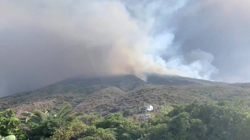 Ash and smoke rises after a volcano eruption started wildfires in Stromboli, Italyin this still image obtained from social media video. Reuters