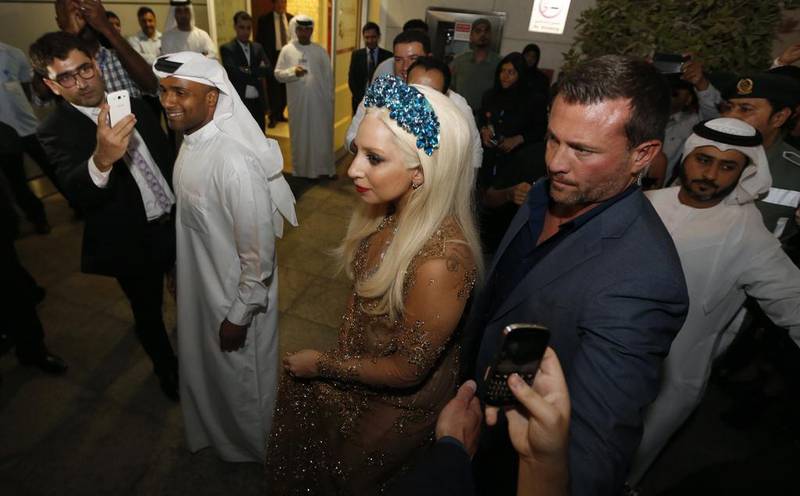 Lady Gaga arrives at Dubai International airport as part of her fourth world tour as ArtRave: The Artpop Ball Tour, where she will perform at the at Meydan Racecourse on September 10. Karim Sahib / AFP photo