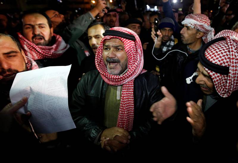 Protesters chant slogans during a protest against the government's tough austerity measures in Amman. Reuters