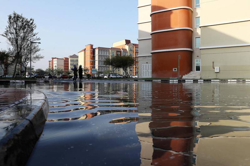 DUBAI , UNITED ARAB EMIRATES , JAN 09 – 2018 :- Water logging because of last night rain at street 8 in Discovery Gardens area in Dubai.  (Pawan Singh / The National) For News. 