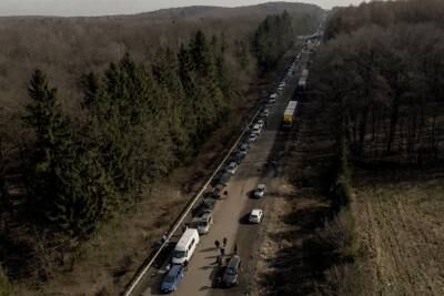 Cars form a line that stretches 35 kilometres from the Shehyni border crossing to Poland as people try to flee Russia's military operation against Ukraine. Reuters