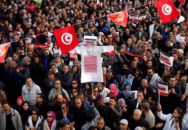 University professors and teachers take part in a protest to demand higher wages in Tunis, Tunisia December 19, 2018. Reuters