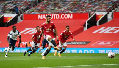 Manchester United's Bruno Fernandes scores from the spot. PA