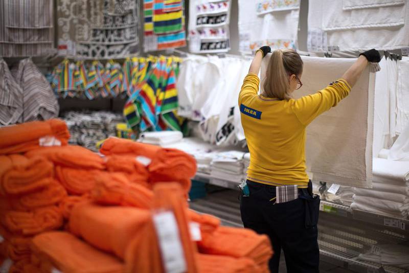 An employee inspects a white towel at an Ikea retail store. Andrey Rudakov / Bloomberg