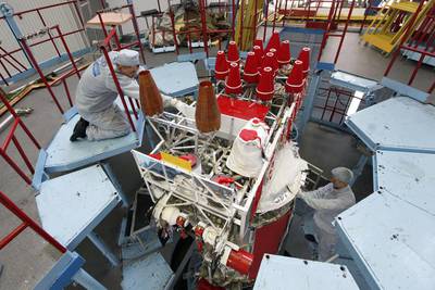 Fitters of space apparatus work on the GLONASS-M space navigation satellite inside an assembly workshop of Reshetnev Information Satellite Systems in Zheleznogorsk. Ilya Naymushin / Reuters