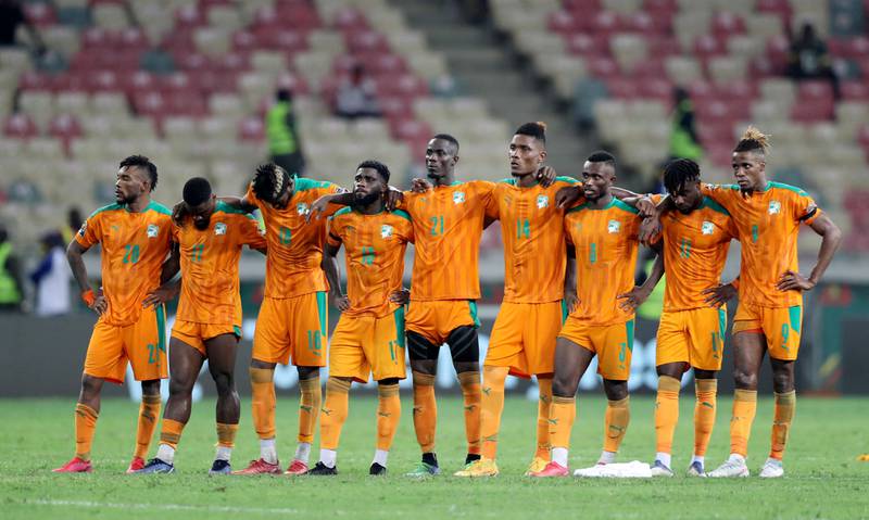 Ivory Coast players during the penalty shootout. Reuters
