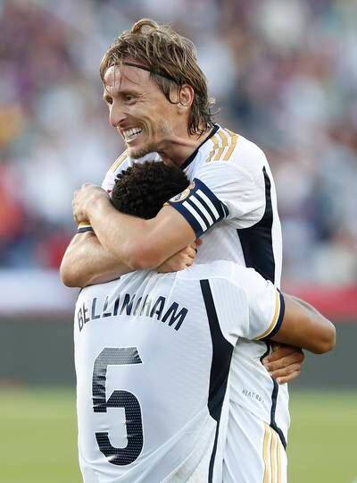 Real Madrid's Jude Bellingham celebrates his second goal with teammate Luka Modric. EPA