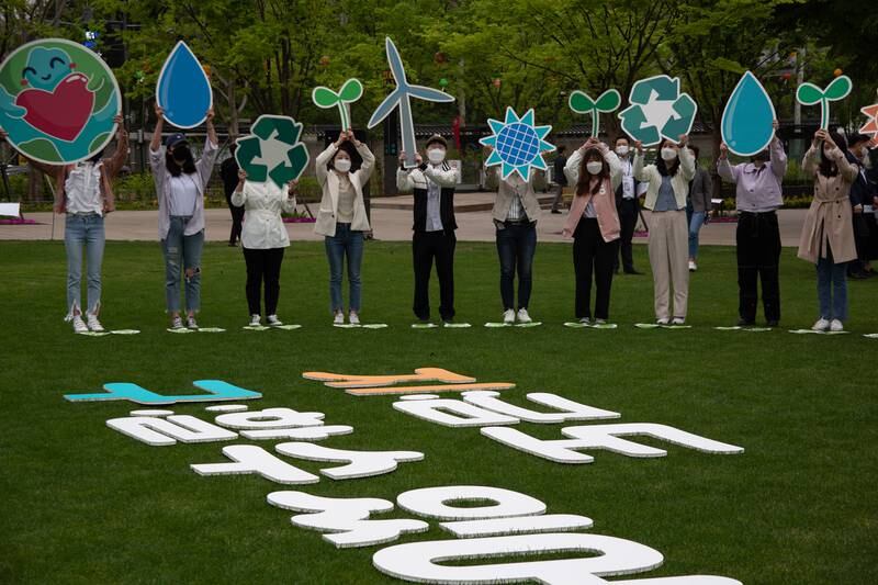 People mark Earth Day outside of Seoul city hall, South Korea. EPA