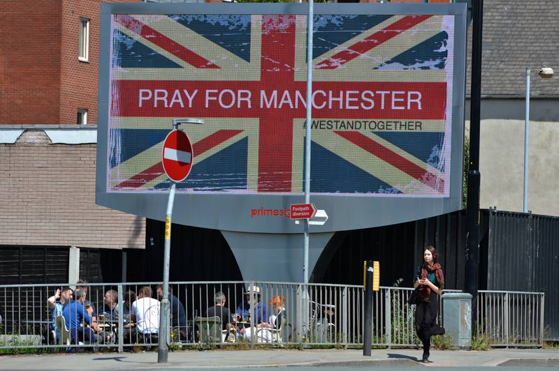 An electronic advertising board close to Manchester Arena on May 23, 2017, a day after the attack. PA
