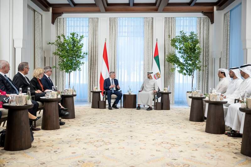 President Sheikh Mohamed meets Mr Nehammer at Al Shati Palace. From right, Dr Sultan Al Jaber, Minister of Industry and Advanced Technology; Sheikh Mohammed bin Hamad, adviser for Special Affairs at the Ministry of the Presidential Court; and Sheikh Mansour bin Zayed, Deputy Prime Minister and Minister of the Presidential Court, also attended the meeting. 