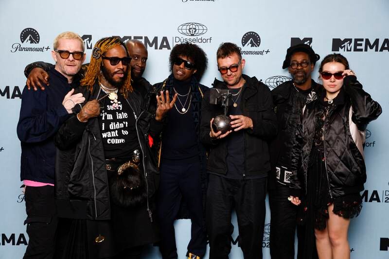Damon Albarn, third from right, celebrated with Gorillaz bandmates and collaborators after winning the Best Alternative award. Getty Images