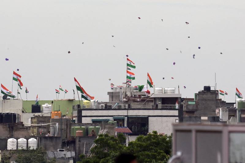 People fly kites to mark India's Independence Day. AFP