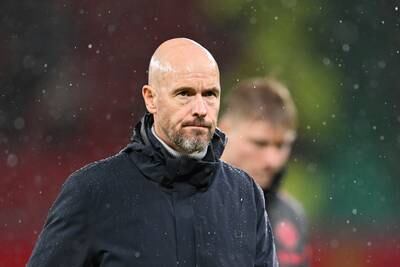 Erik ten Hag, manager of Manchester United, looks dejected after the team's defeat in the Premier League match against Manchester City. Getty Images
