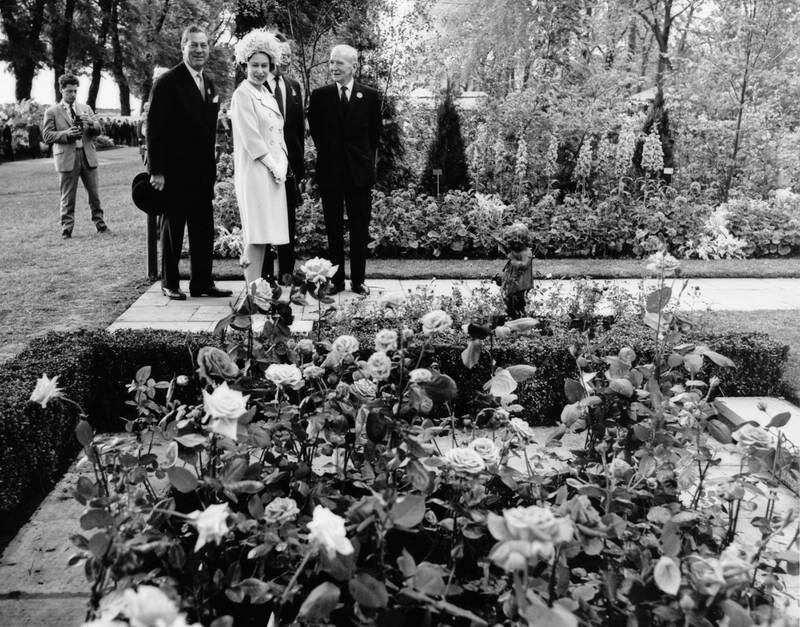 Queen Elizabeth viewing a rose bed, exhibited by 'Popular Gardening' magazine, during a tour in 1962. Getty Images