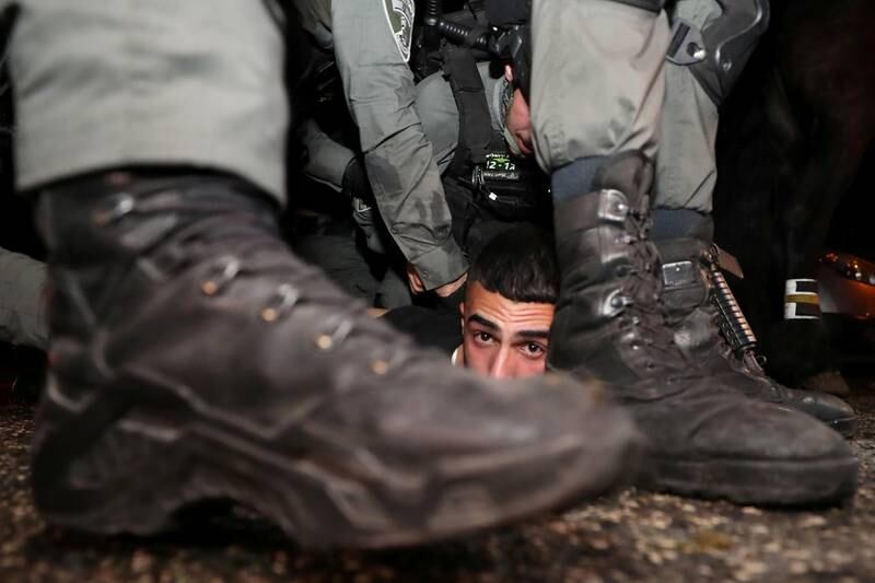 Israeli police detain a Palestinian protester during demonstrations before a court hearing in an Israeli-Palestinian land ownership dispute in the Sheikh Jarrah district of East Jerusalem. Reuters
