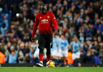 Manchester United's Romelu Lukaku looks dejected after Manchester City's third goal. Reuters