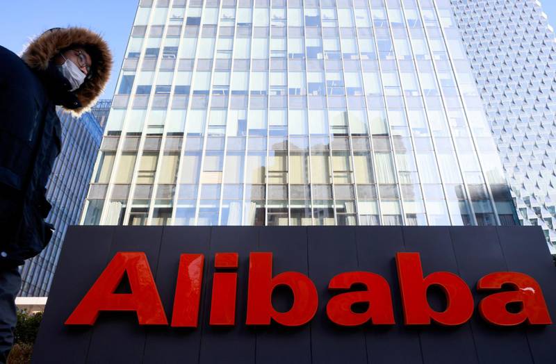 FILE PHOTO: FILE PHOTO: The logo of Alibaba Group is seen at its office in Beijing, China January 5, 2021. REUTERS/Thomas Peter/File Photo