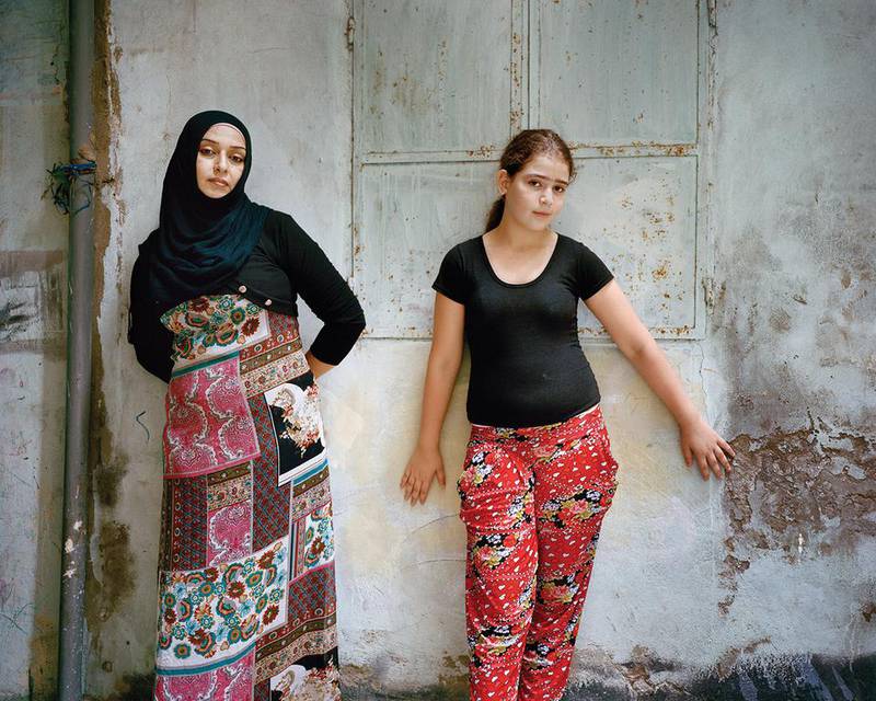 Nisreen and Ola at Bourj El Barajneh Refugee Camp, Beirut, Lebanon, 2015 from “Unspoken Conversations’ series