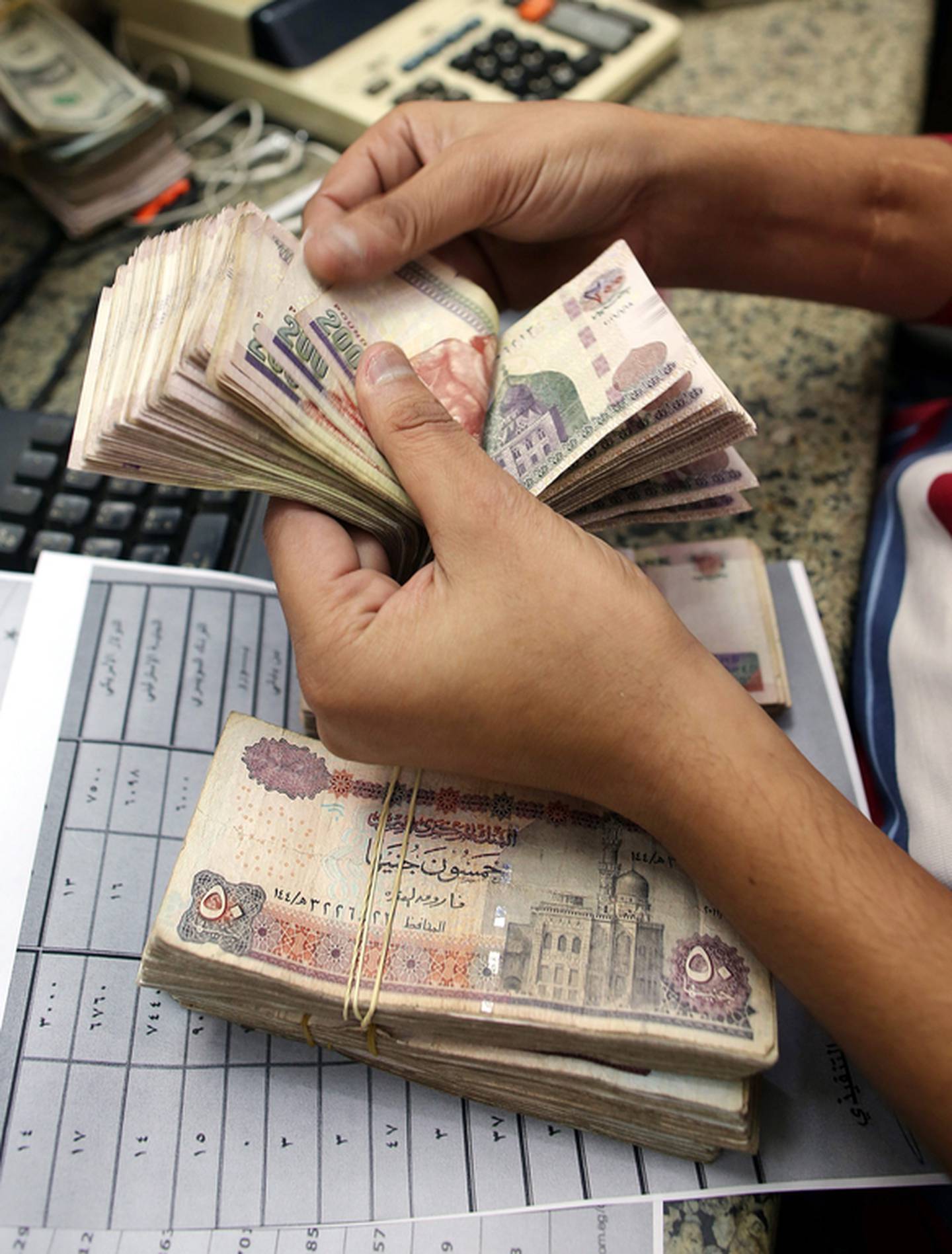 The Egyptian pound lost more than 10 per cent of its value against the US dollar on Monday. EPA