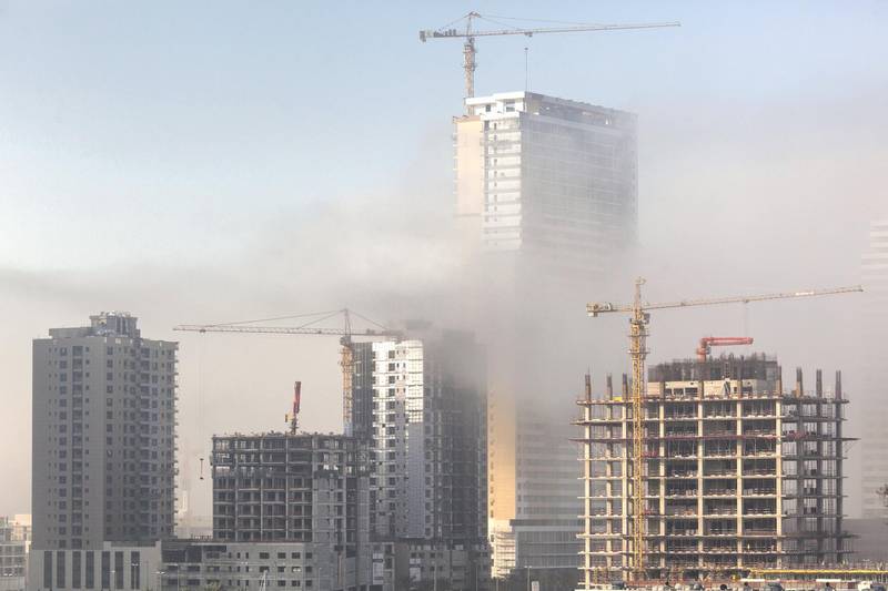 Dubai, United Arab Emirates, December 31, 2017:    Construction is enveloped in fog in the Jumeirah Village Circle area of Dubai on December 31, 2017. Christopher Pike / The NationalReporter:  N/ASection: News