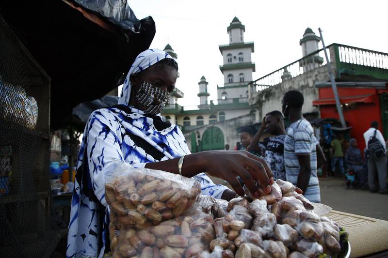 A woman sells dates outside a mosque in Williamsville, Abidjan, Ivory Coast, during the holy month of Muslim Ramadan. Muslims around the world celebrate the holy month of Ramadan by praying at night and abstaining from eating, drinking and sexual acts during the period between sunrise and sunset. Ramadan is the ninth month of the Islamic calendar, and the revelation of the first verse of the Qur'an is believed to have taken place during its last 10 nights.  EPA