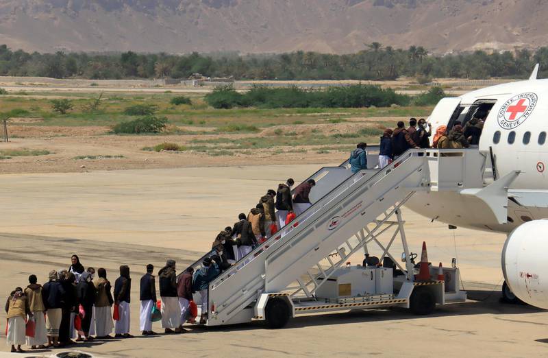 Houthi prisoners board a plane before heading to Sanaa airport after being released by the Saudi-led coalition in a prisoner swap, at Sayoun airport, Yemen. Reuters