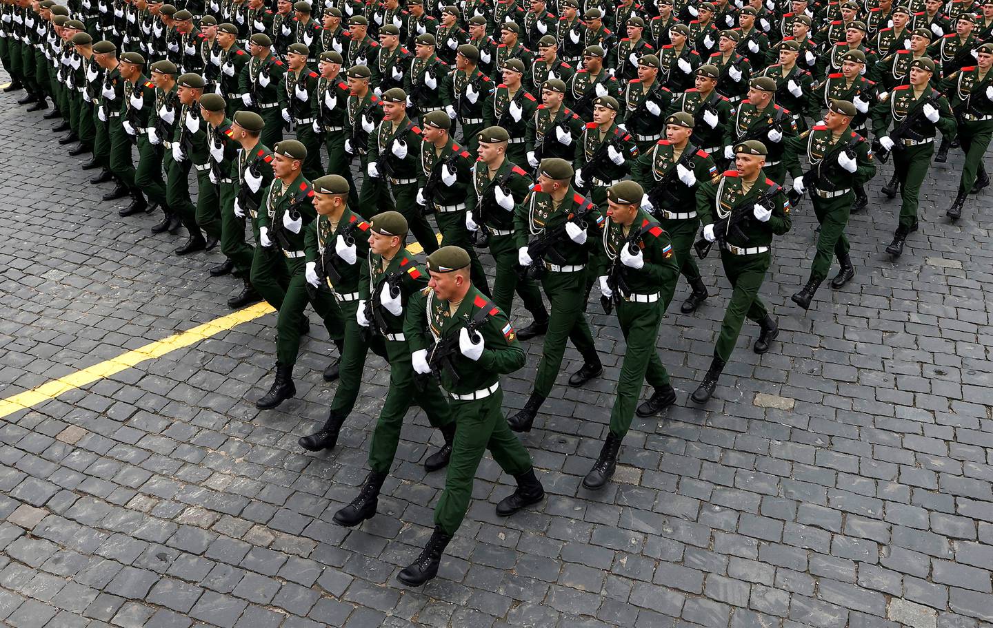 Russian service members march during a military parade on Victory Day, in Moscow's Red Square. Reuters