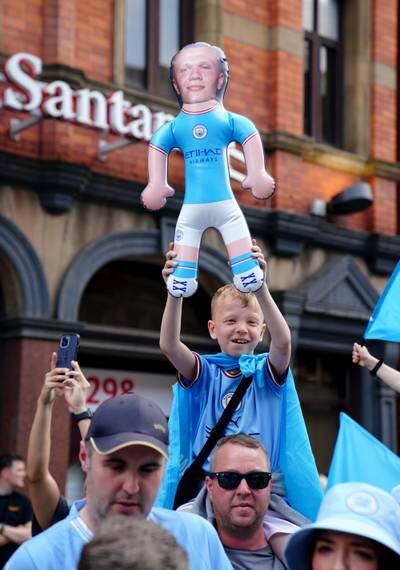 A City fan with an inflatable Erling Haaland doll. PA 