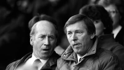 Manchester United manager Alex Ferguson, right, alongside former Manchester United and England international Bobby Charlton in 1986. PA